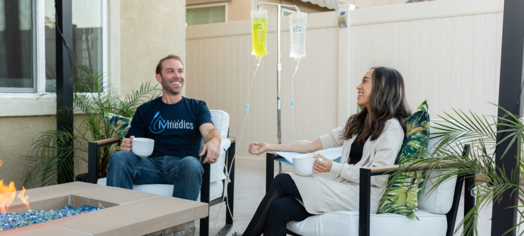 girl and guy getting iv therapy