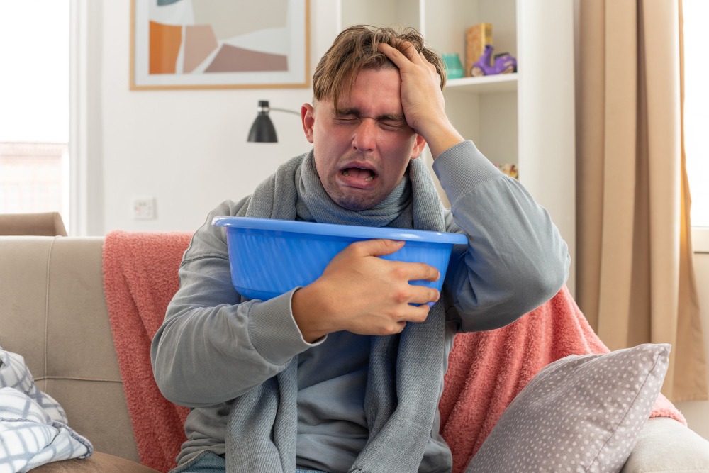Fluid loss from prolonged vomiting causes dehydration and tiredness